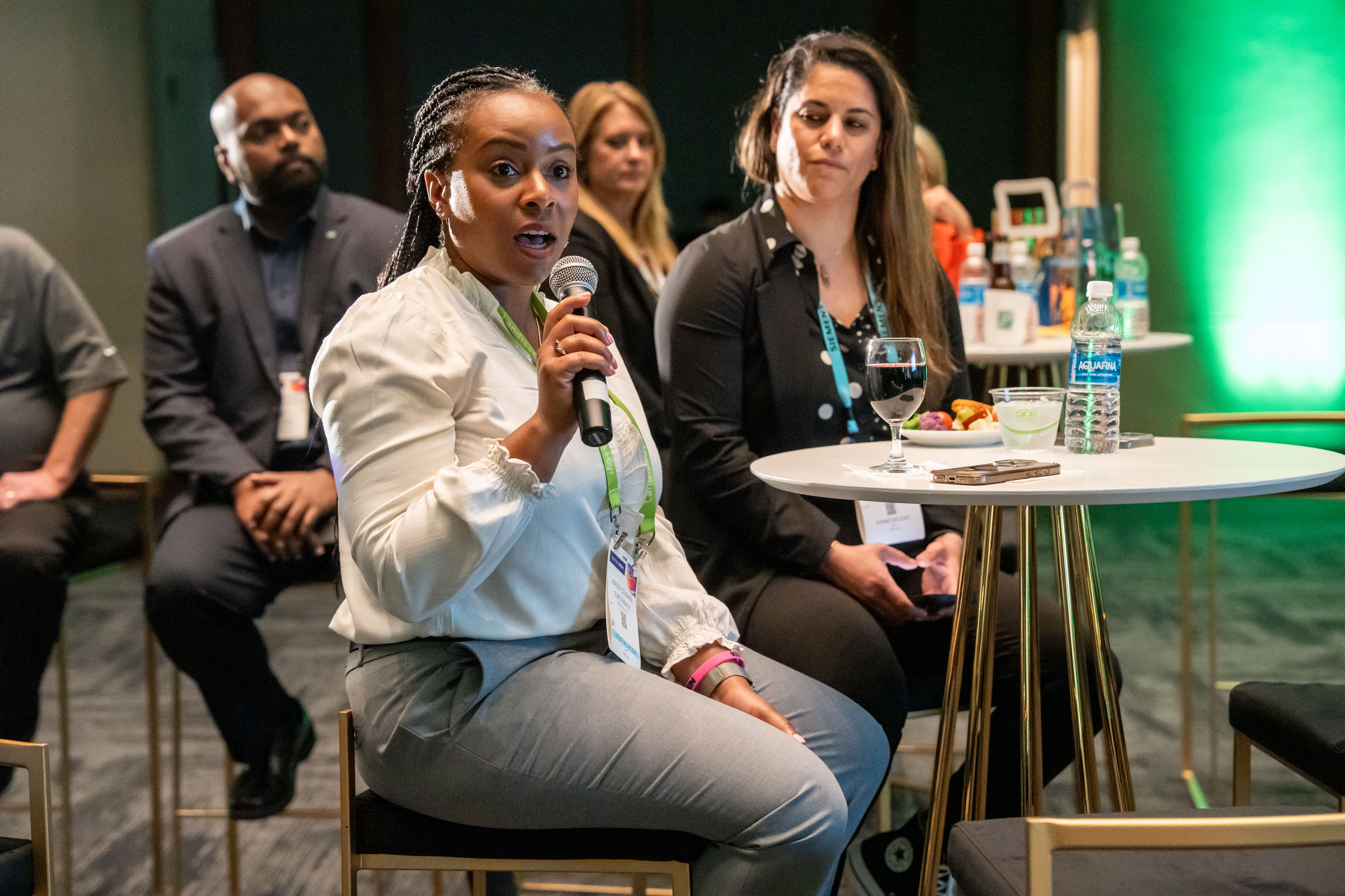 An attendee of the 2025 S&C Powered by Diversity Event engages in an interactive dialogue with the event moderator